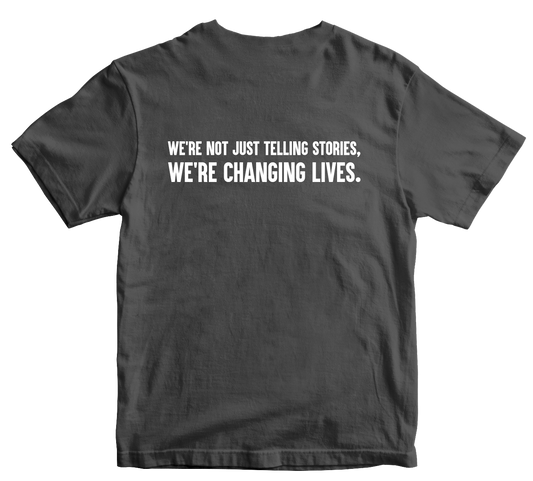 We're Not Just Telling Stories, We're Changing Lives T-Shirt Charcoal