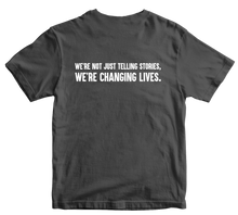 Load image into Gallery viewer, We&#39;re Not Just Telling Stories, We&#39;re Changing Lives T-Shirt Charcoal
