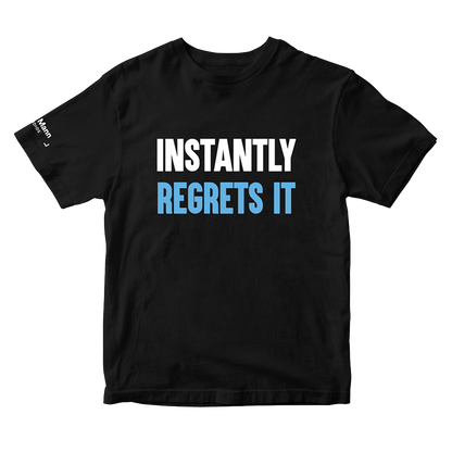 A black short-sleeve t-shirt with the text 'INSTANTLY REGRETS IT'; 'Instantly' is printed in white and 'Regrets it' is printed in light blue. The right sleeve of the t-shirt also has a printed white tag of the "Dhar Mann Studios" logo